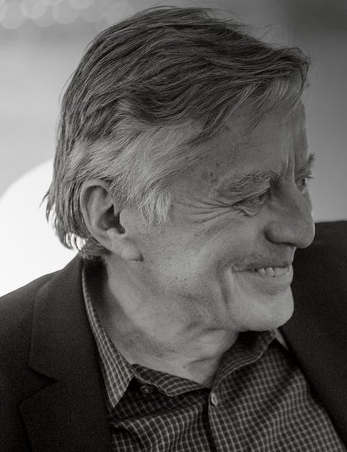 A side profile black and white portrait of Mac Van Wielingen.